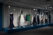 Installation view of gowns and ensembles in the rear gallery of Asian Americans in New York Fashion: Design, Labor, Innovation.
