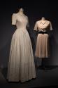 Dior + Balenciaga, Left to right 72.112.144 (striped cotton dress), 72.81.19 (beige dress)