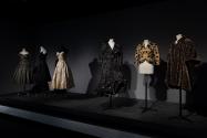 Dior + Balenciaga, Left to right: 82.208.9 (grey dress), 71.213.25 (black dress), 75.86.5 (strapless evening dress), 86.142.5 (polka dot dress), 68.151.1 (yellow and black jacket), 86.142.3 (evening coat) 
