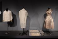 Dior + Balenciaga, Left to right: 89.155.1 (man's jacket), muslin copy and 77.27.2 (dress in case), 71.213.20 (beige satin dress)