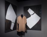Dior + Balenciaga, 72.81.23 (coat), a pattern of the coat is mounted on the wall