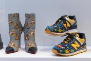 A pairing of boots by Christian Louboutin for Stella Jean and sneakers by Ricardo Seco, made in collaboration with the Huichol (or Wixáritari) people of Mexico, both from 2015. 