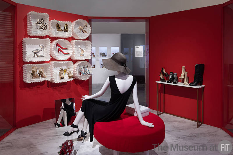 A view of the Magic: Shopping section of the exhibition, featuring 21st-century shoe styles. 