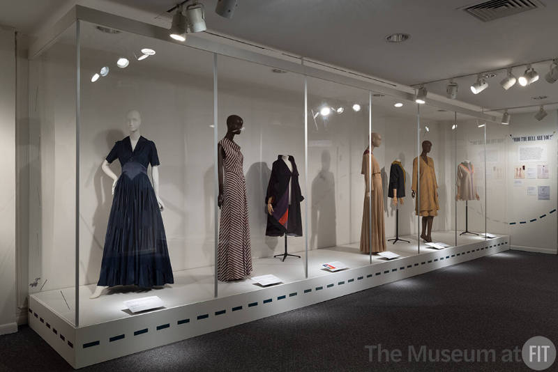 Elizabeth Hawes, Left to right 69.156.5 (blue evening dress), 69.156.6 (striped evening dress), 76.130.1 (coat), 69.156.3 (beige evening set), 76.130.12 (overblouse), 76.130.2 (yellow set), 78.119.2 (tunic)