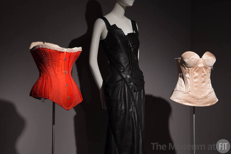 Power_Mode_06 Left to right 98.29.3 (corset), 2001.45.1 (dress), 2017.61.1 (corset)