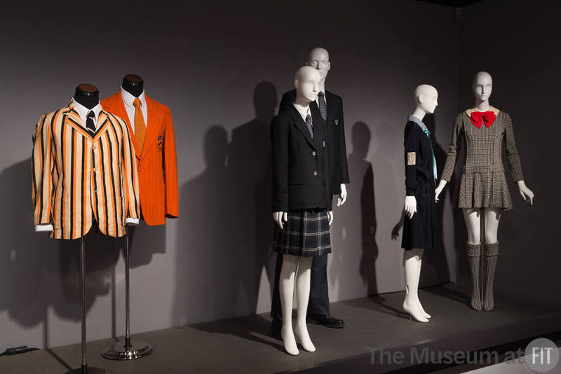 Uniformity_20  Left to right P89.40.25 (striped jacket), 2012.2.1 (jacket), 2010.24.3 (girl's uniform), 2010.24.4 (suit uniform), 2015.60.1(skirt uniform),  75.112.5 (mini dress)