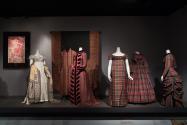 Trendology_08 Left to right 82.189.58 (textile wall), P85.19.1 (dress), P86.71.2 (shawl), 76.208.7 (man's dressing gown), 89.154.12 (dress), 68.175.1 (shawl wall), P88.9.1 (empire dress), 70.15.15 (full skirt dress), P88.22.1 (dress)