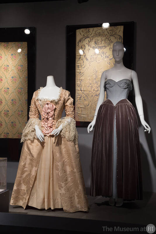 RetroSpective_23 Left to right P78.3.2 (dress), 80.30.42B (textile wall), 84.125.3 (evening dress)