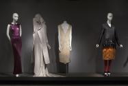 Fashion A-Z (II)_37 Left to right 89.163.91 (dress), 2011.3.1 (ensemble), 96.69.13 (dress), 2007.20.1 (coat ensmeble) 