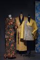 Exoticism_16 Left to right 74.115.3 (dress), P89.4.1 (gold robe),  74.36.17 (jacket)