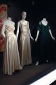 Rainbow_50 Left to right  P88.3.1 (textile wall), 77.187.6 (white satin gown), 93.71.12 (silk dress), P86.66.5 (green dress)