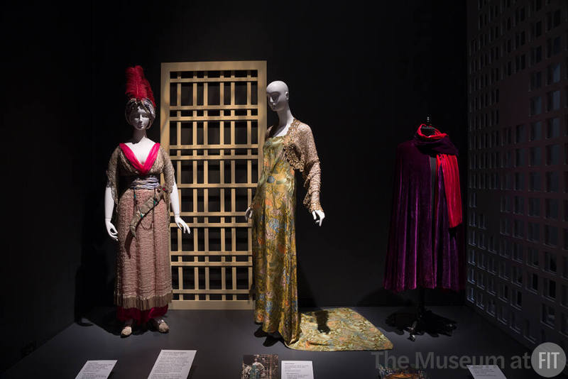 Exhibitionism_21Left to right 74.36.29 (ensemble), 74.36.27 (dress), 69.160.3 (cape) 