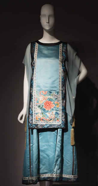 Blue sleeveless tunic with panel of Chinese floral and butterfly embroidery over long dress wit…