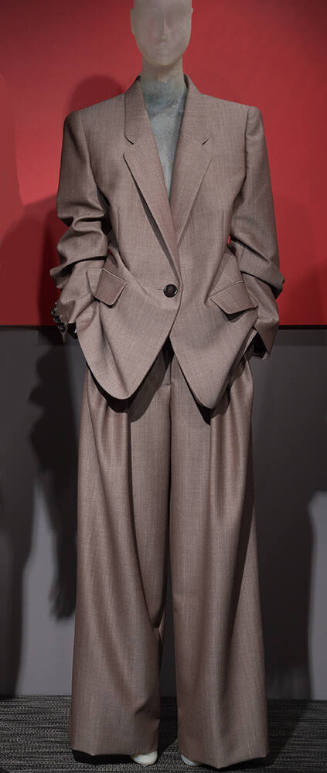 Brown oversize wool pantsuit with single button long sleeve jacket with lapels and baggy pants 
