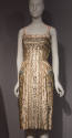 Ivory cocktail dress embroidered in metallic floral design, blue feathers and beads with thin c…