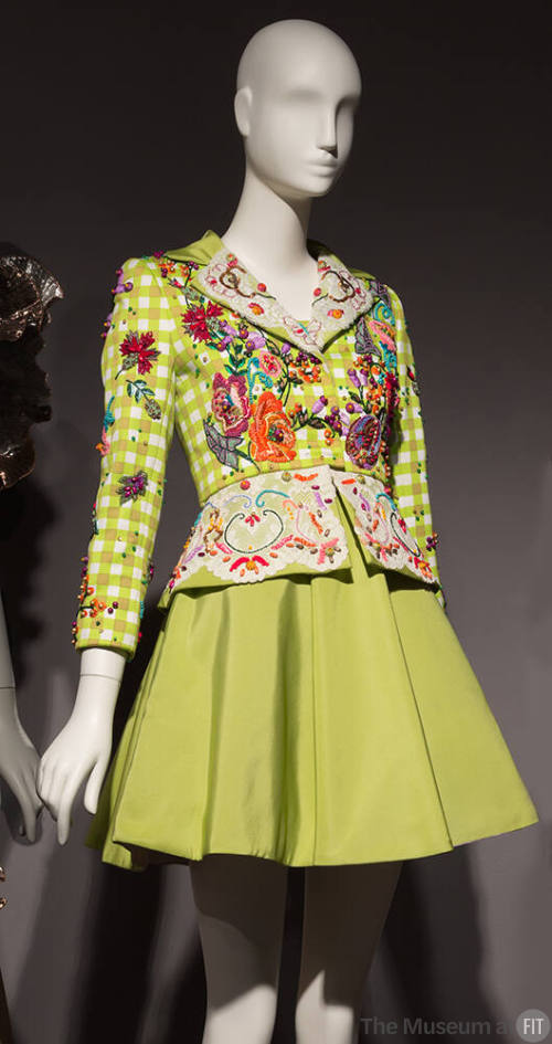Chartreuse, tan, and white check jacket and emroidered multicolor floral design with matching b…