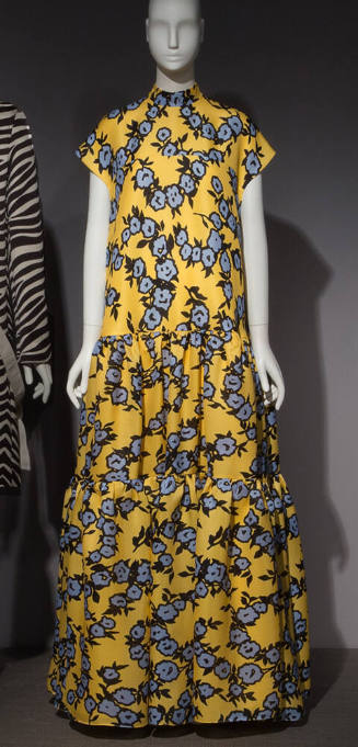 Yellow short sleeve floor length dress with grey floral pattern 