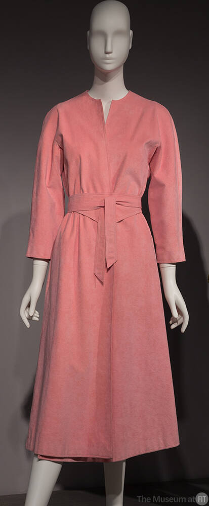 Pink Ultrasuede calf length wrap dress with V-neckline, long sleeves and large tie belt