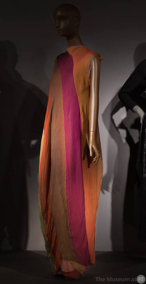 Long sleeveless evening shift gown with ochre yellow, brown, purple, olive green, rust grown, a…