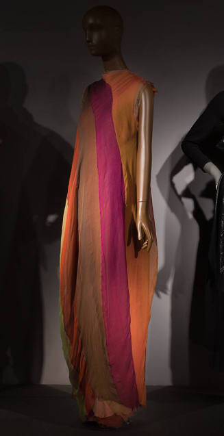 Long sleeveless evening shift gown with ochre yellow, brown, purple, olive green, rust grown, a…