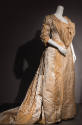 Cream satin evening gown with floral embroidery and lace front 3/4 sleeve bodice, floor-length …