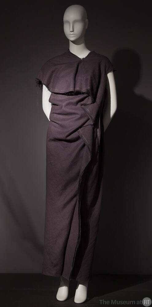 Grey deconstructed, asymmetrical, floor legnth dress with contrast white tailors' tacks and exp…