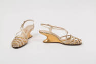 Gold metallic and cream strap sandal with sculpted wedge F heel