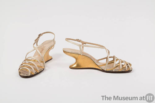 Gold metallic and cream strap sandal with sculpted wedge F heel