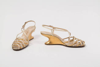 Gold metallic and cream strap sandal with sculpted wedge F heel