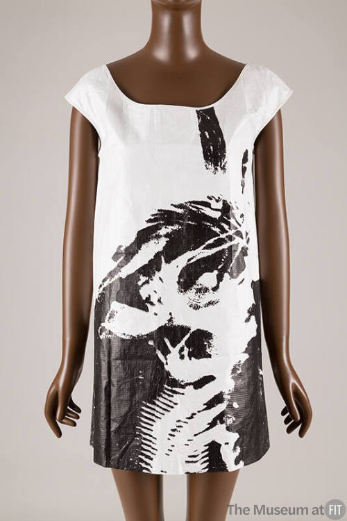 White cap sleeve mini dress with black abstract design