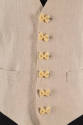 Deatil shot of off-white vest  with six pasta buttons