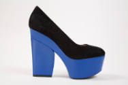 Side view of black pump with high blue platform and chunky heel