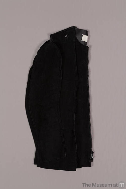 Folded view of black suede long sleeve zip front jacket 