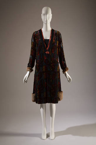 Black/ mulitcolor long sleeve dress with velvet pattern, pink ribbon trim V at neck, fur cuffs …