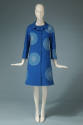 Blue 7/8 sleeve A-line coat with two tone medium blue and light blue inset circles in a random …