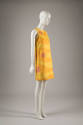sleeveless yellow knee-length dress with horizontal wavy orange sections and interspersed red c…