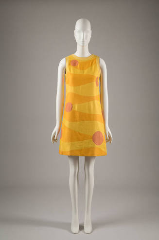 Front View: Sleeveless yellow knee-length dress with horizontal wavy orange sections and inters…