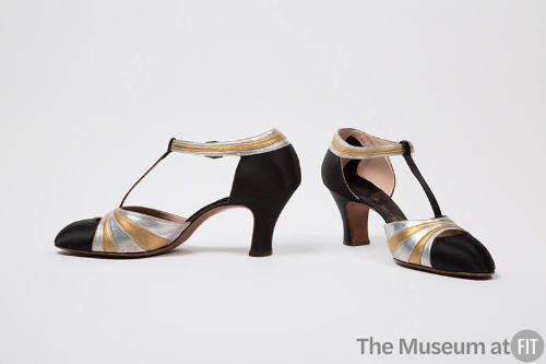 Gold and silver metallic shoes with black toe, T-strap and heels