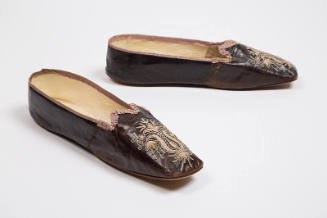 Pair of dark purple/brown leather slippers with rounded square toe, light purple floral cutout …