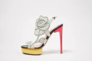 multi color high heel shoes: white upper with black scribble line drawing off a flower, yellow …