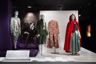 A Queer History of Fashion: From the Closet to the Catwalk exhibition installation view of dres…