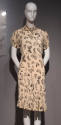 Ivory knee length dress with black butterfly print and turtleneck collar