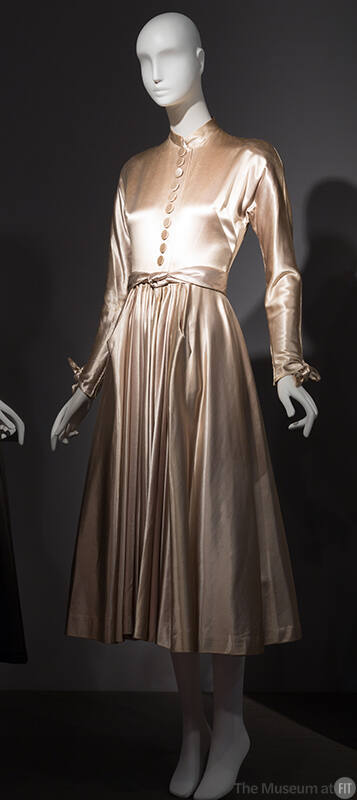 Beige satin long sleeve dress with button front, tie belt and gathered skirt 