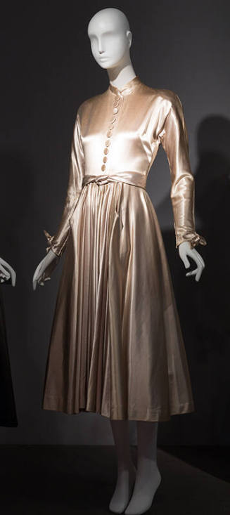 Beige satin long sleeve dress with button front, tie belt and gathered skirt 