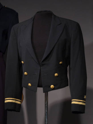 Black uniform jacket with mock double breasted front of six gold buttons and gold bands and sta…
