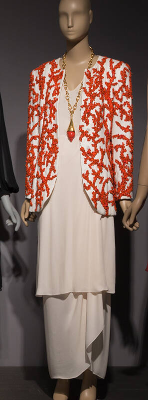 White linen jacket with faux coral embroidery; sheer white tunic, skirt and pants
