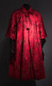 Red and black floral evening coat with elbow length sleeves and roll collar 