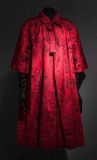 Red and black floral evening coat with elbow length sleeves and roll collar 