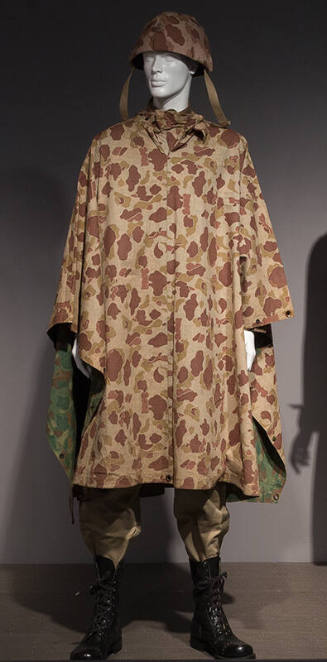 Tan and brown reversible camouflage poncho with green pattern inside