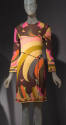 Long sleeve shift dress with large scale frond and lobe print in earth tones; belt with clear b…